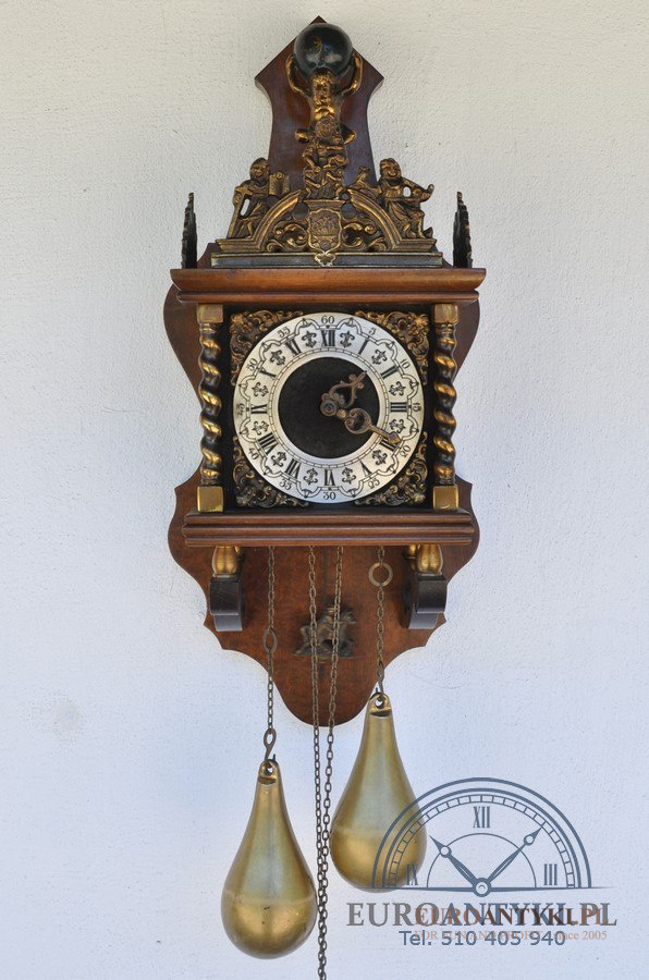 zegar holender z atlasem